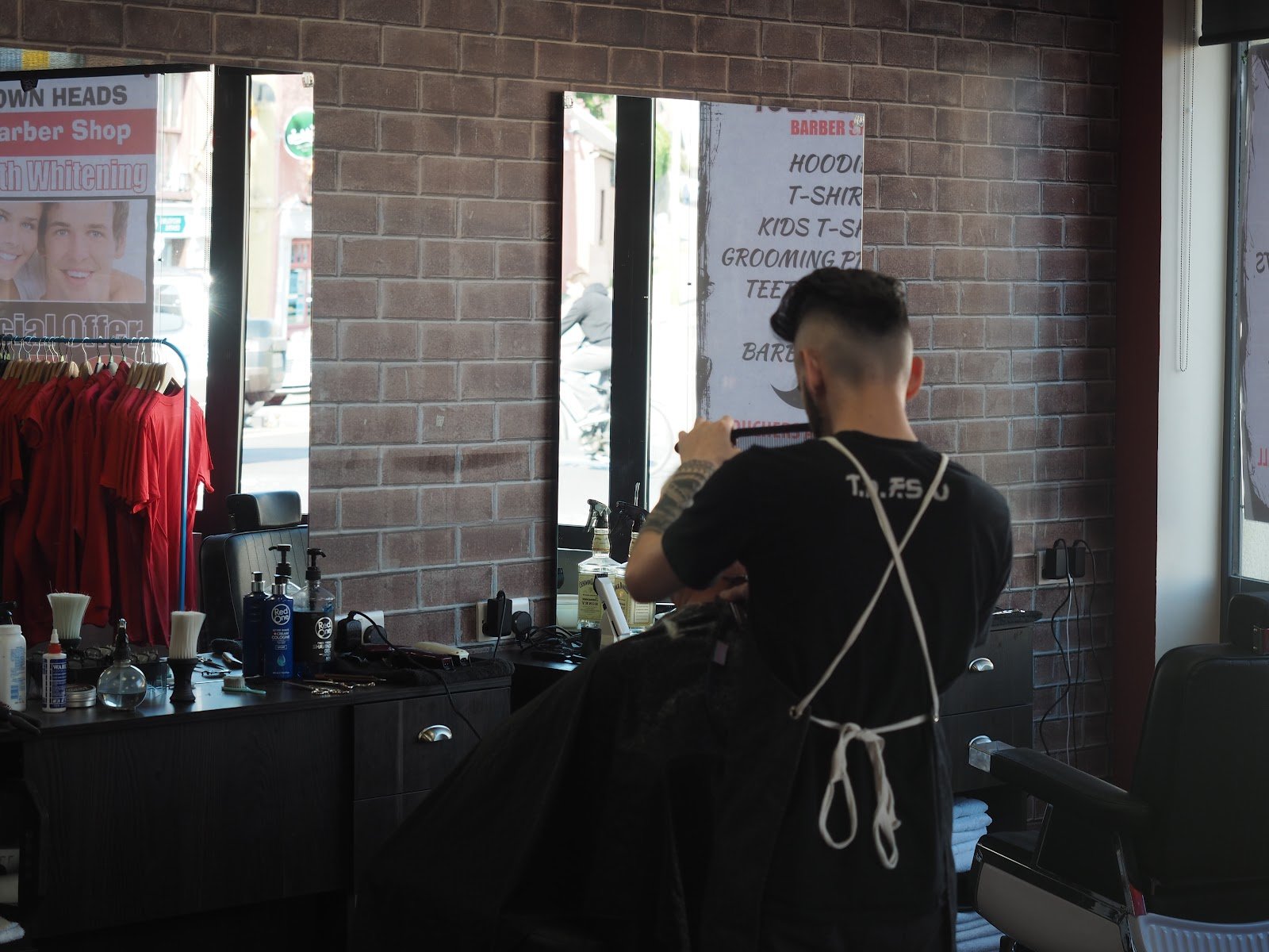 A Town Heads barber at work